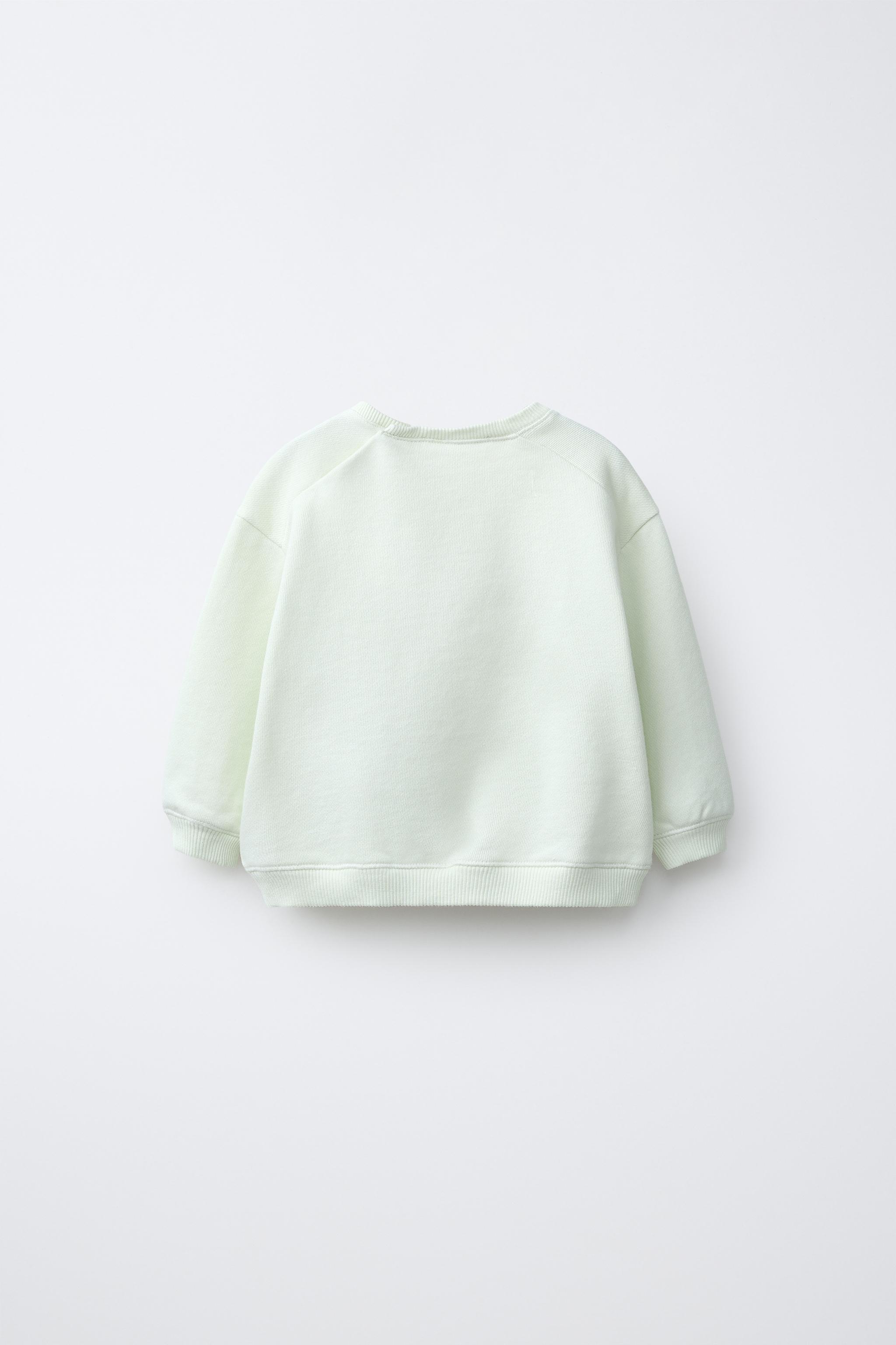 SWEAT POUSSIN BRODÉ EN VELOURS BOUCLÉ